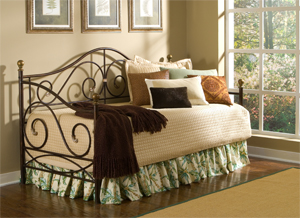 Metal Daybed in brown finish and gold Finials